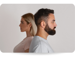 Gender equality and diverging views. Serious man and woman look in different directions, side view, panorama, copy space