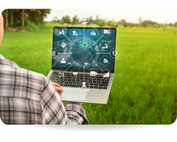 Innovation technology for smart farm system in laptop with smart technology concept. Asian man farmer working outfield farm